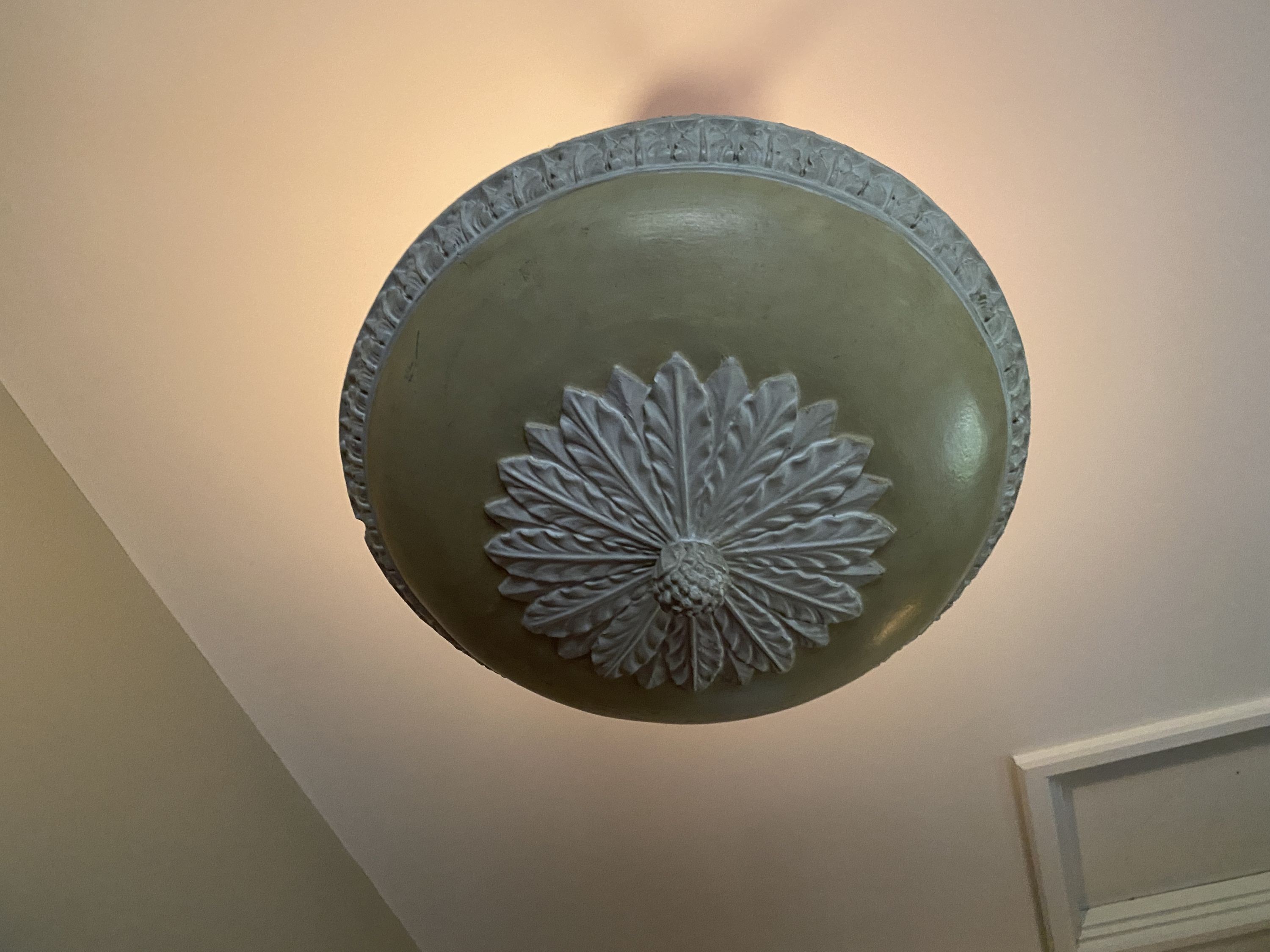 A plaster cast pineapple and acanthus leaf light fitting, diameter 50cm drop 45cm